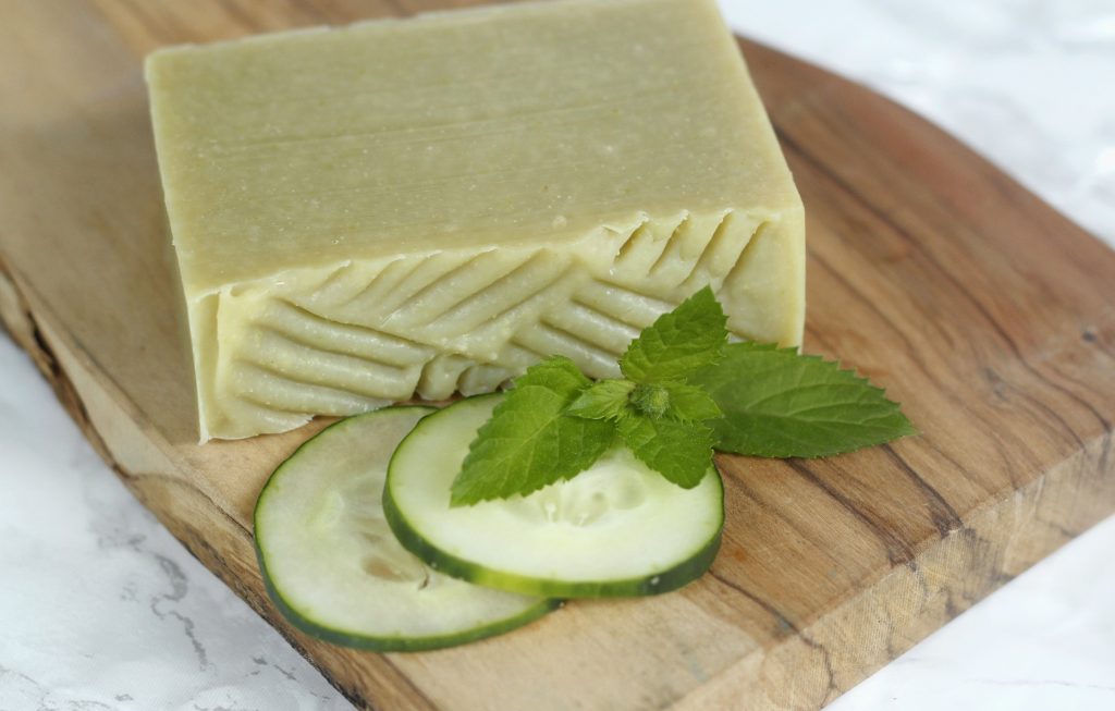 a bar of soap with a cucumber