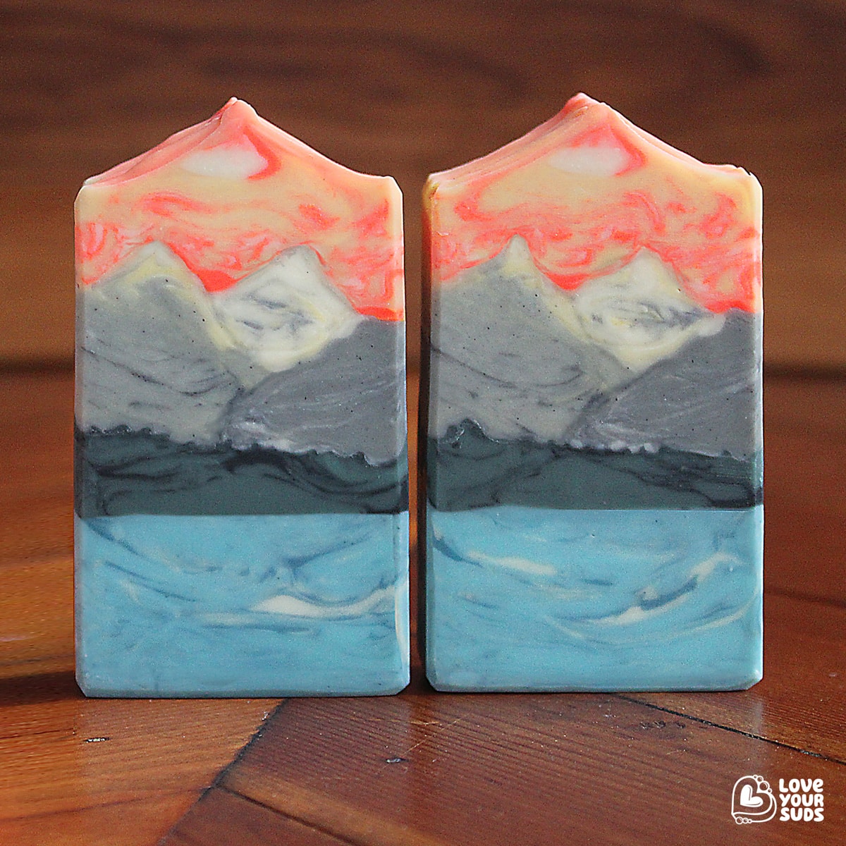 soap landscape with water and mountains.
