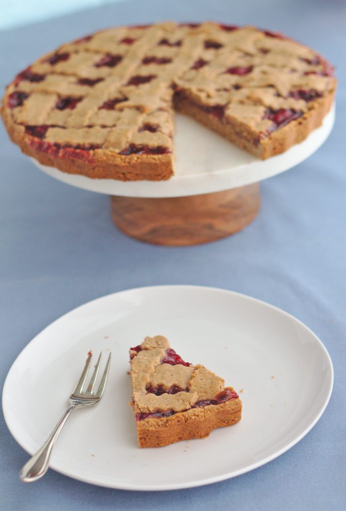 This linzer torte recipe is is an original from Austria. It's a traditional Christmas cake filled with raspberry jam. #christmasbaking #baking #bakingrecipe