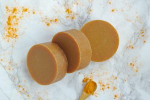 This cold process soap recipe uses papaya, turmeric and essential oils to add interest. Adding fresh ingredients is a great technique to spice up your handmade soap making. #codlprocess #DIY #soap #handmade
