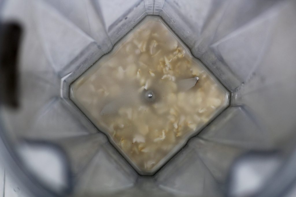 rolled oats and water in blender