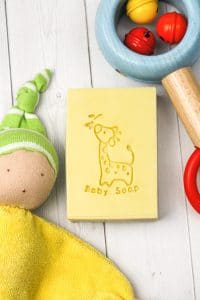 stamped baby soap with baby toys.
