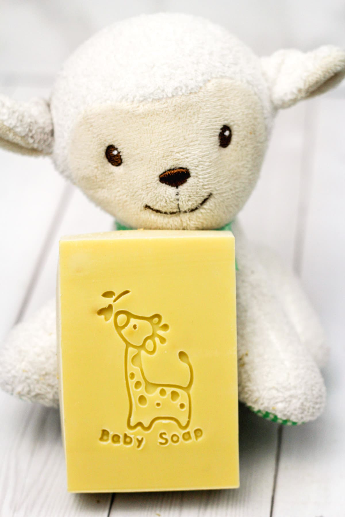 bar of baby soap held by stuffed animal.