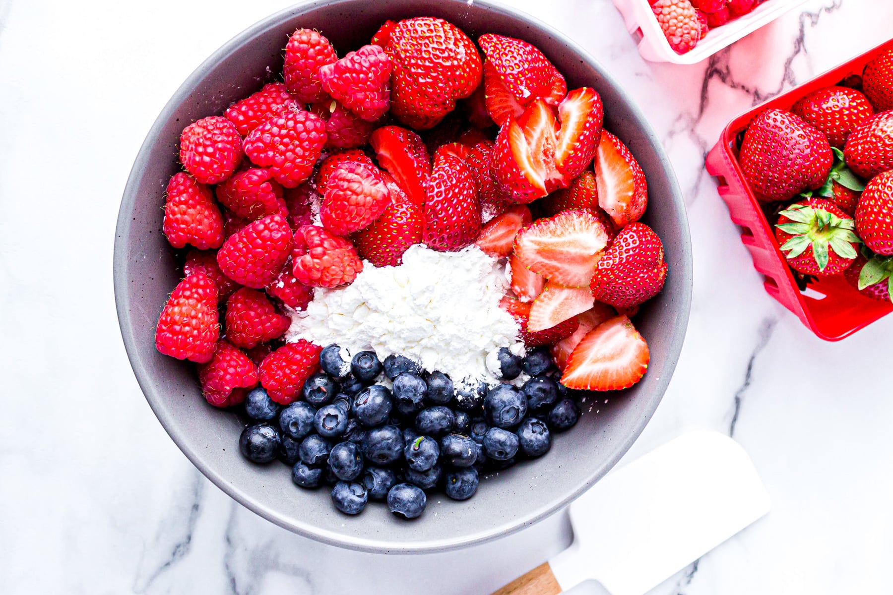 berries in bowl with other ingredients.
