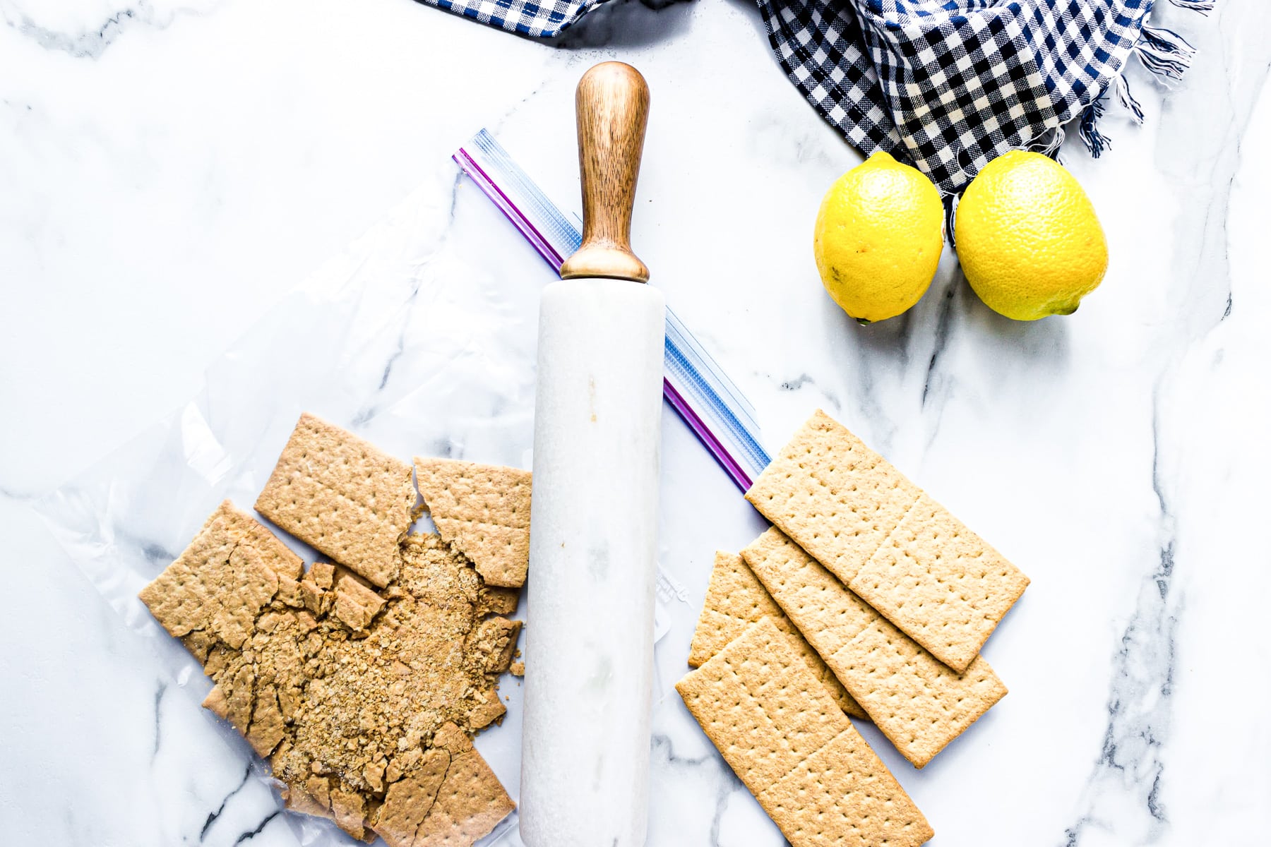 rolling pin with crushed graham crackers.